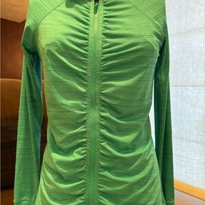 Sweet Athleta spring green, long sleeve, hooded top with ruching detail!